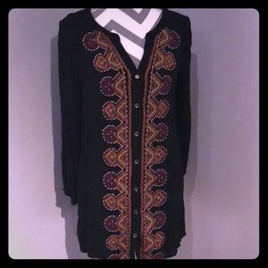 Knee length long sleeved tunic dress. Rayon.